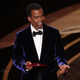 Chris Rock speaks onstage during the 94th Annual Academy Awards at Dolby Theatre on March 27, 2022 in Hollywood, California.
